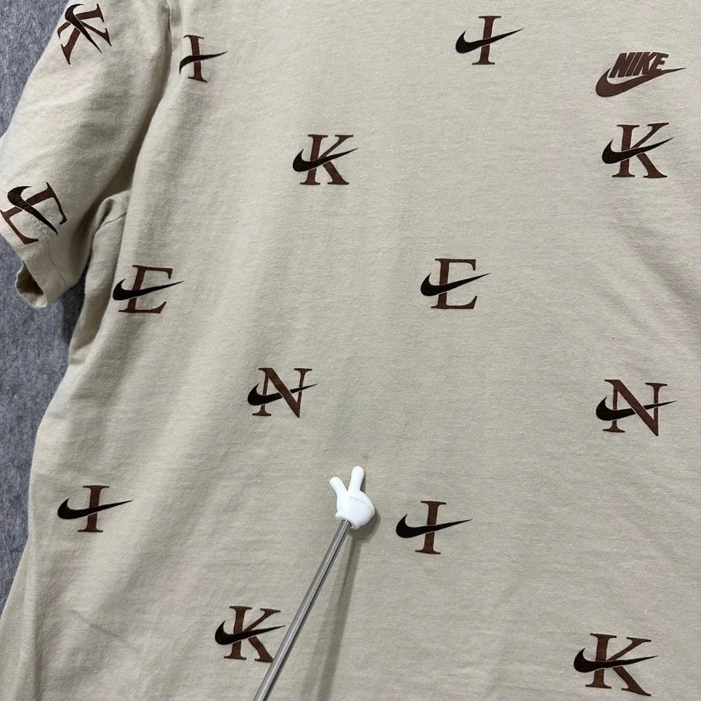 Nike‎ The Nike Tee Tan Brown Mens Size Large All Over Print Swoosh Logo T-Shirt